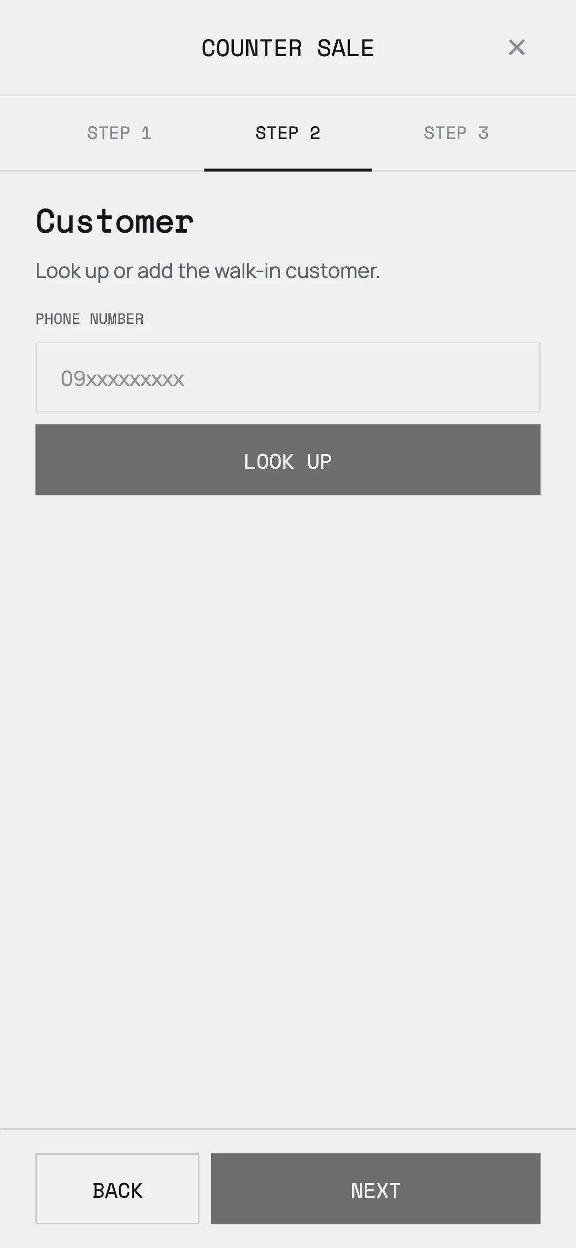 The next step of a counter sale: looking the walk-in customer up by phone number.